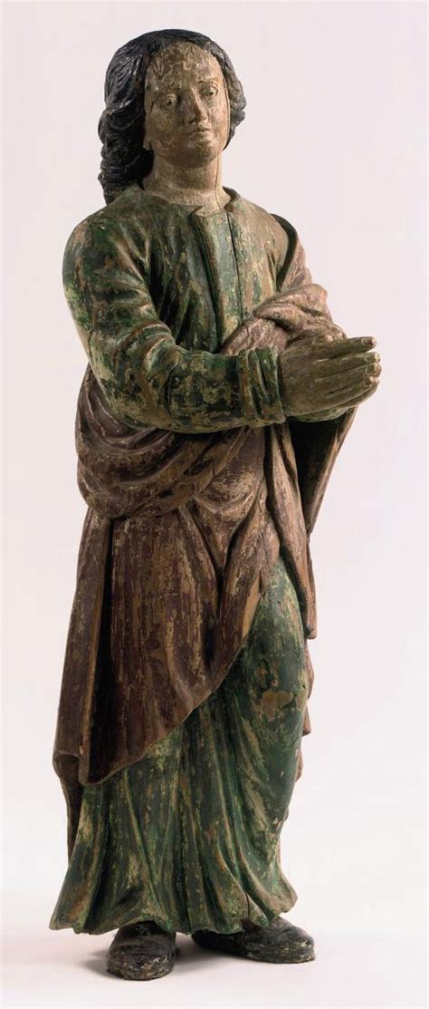 A Polychrome Carved Wood Figure Of Saint John The Evangelist