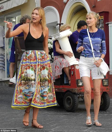 Karlie Kloss Soaks Up The Sights Of Capri Wearing Bright Retro Skirt