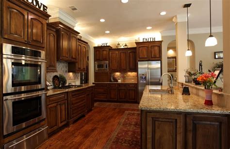 Even if your darker floors the light cabinets and dark floors combination can be very effective whether your style is contemporary or traditional. Gorgeous! | Hardwood floors in kitchen, Kitchen flooring ...