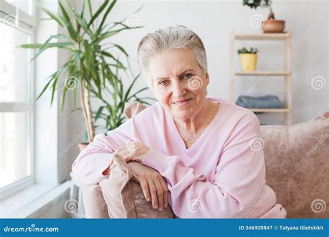 Smiling Middle Aged Mature Grey Haired Woman At Home Stock Image