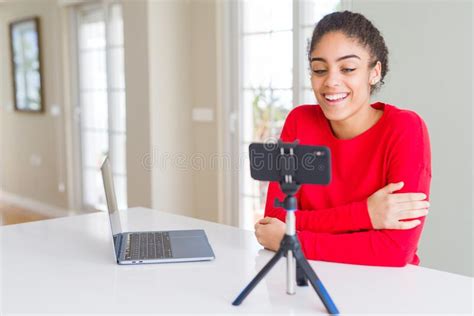 Young African American Woman Doing Video Call Using Smartphone Camera Happy Face Smiling With