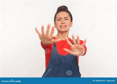 I`m Afraid Portrait Of Scared Terrified Brunette Man Making Frightened Gesture With Raised