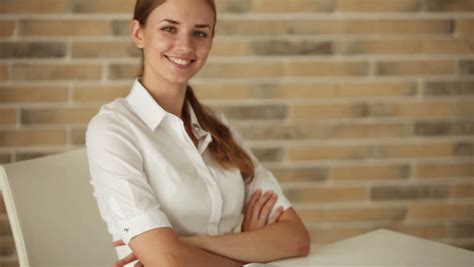 Beautiful Girl Sitting At Desk Stock Footage Video 100