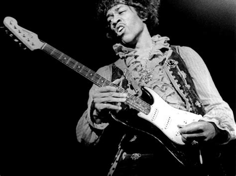 Jimi Hendrix Playing Guitar Smoking