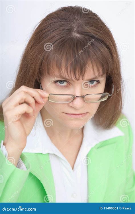 Serious Woman Teacher Looks At Us Over Glasses Stock Image Image Of