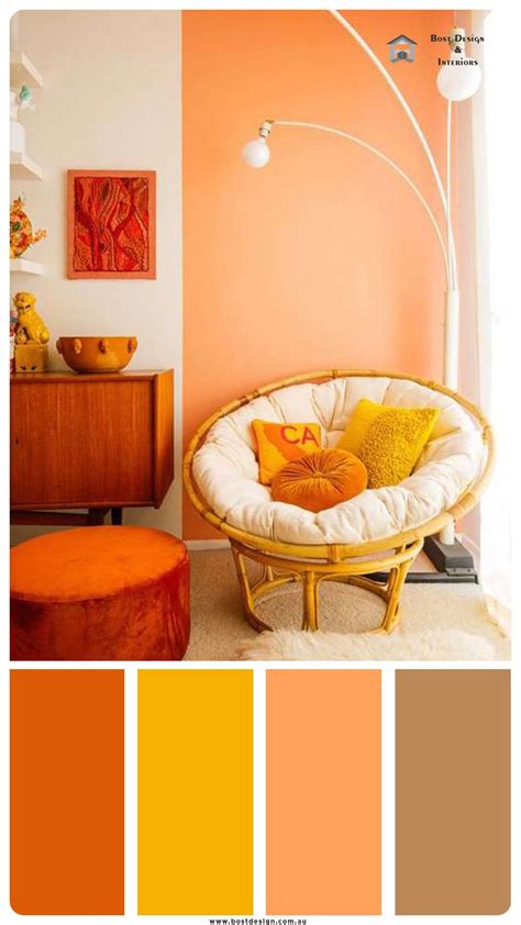 A Living Room With Orange And Yellow Colors In The Walls Furniture And Decor Items