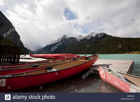 Canoes On Lake Louise Banff National Park Alberta Canada Stock Photo