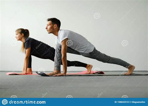 Couple Is Doing Yoga Together Healthy Lifestyle Concept Stock Photo