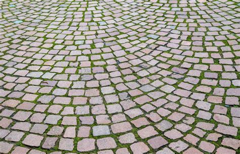 Detailed Close Up View On Cobblestone Streets And Sidewalks In High