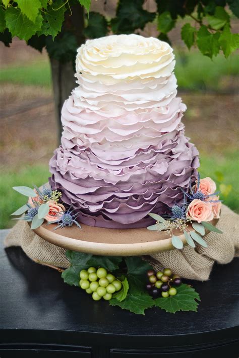 A Stunning Fall Wedding Cake Featuring Fondant Ruffles And A Purple