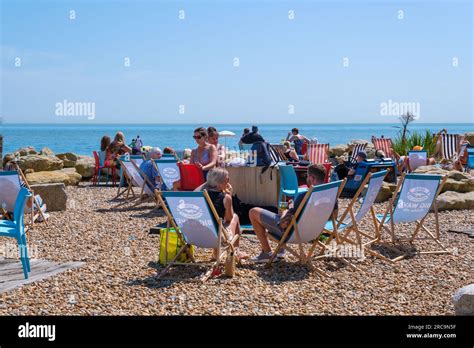 Folkestone Uk 9 July 2023 People On Sunny Sands Beach Enjoying The