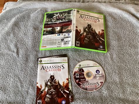 Assassin S Creed Ii Item Box And Manual Xbox
