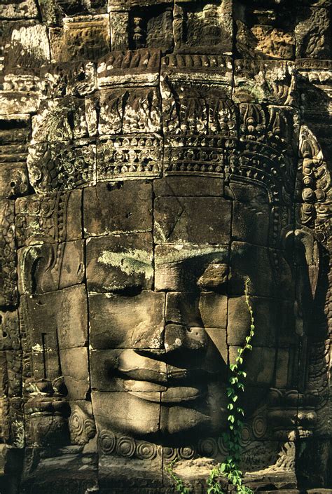 Buddha Face Carved Into Stone Bayon License Image 70045041