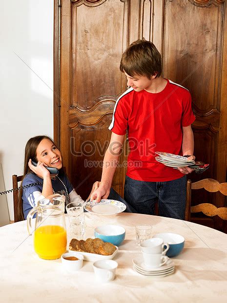 brother and sister having breakfast picture and hd photos free download on lovepik