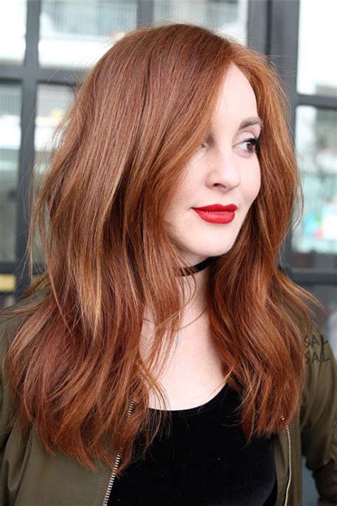 Long straight hair with layers The Best Medium Hairstyles for Thick Hair - Southern Living