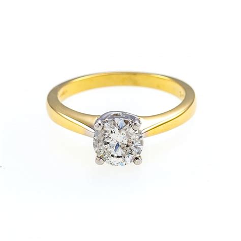 Stock list of solitaire rings in eighteen carat yellow gold direct from uk designer of high quality diamond rings in 18 ct gold or platinum. 18ct Gold 1 Carat Diamond Solitaire Ring for Women