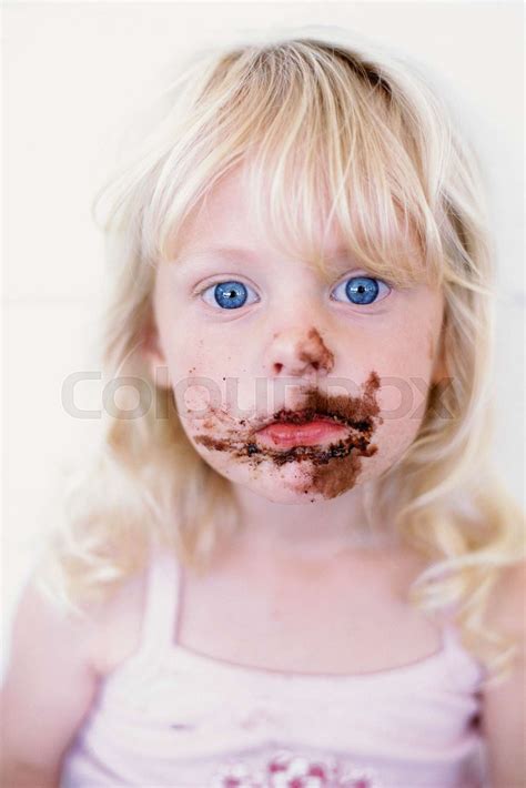Girl With Chocolate On Her Face Stock Image Colourbox