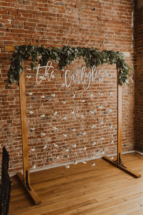 Cute Boho Diy Photo Booth Ideas With Wooden Frame And Seeded Eucalyptus