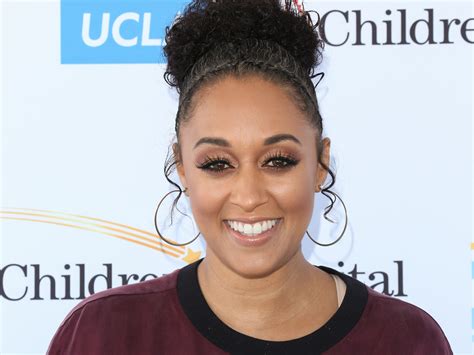 tia mowry s body measurements including height weight dress size shoe size bra size