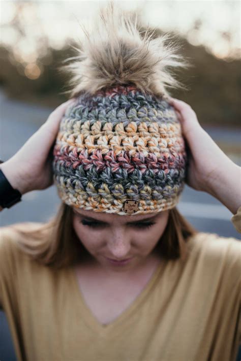Cute hat with two crocheted bear appliques sewn onto. Woodlands Faux Fur Pom Hat | Cute winter hats, Winter hats ...