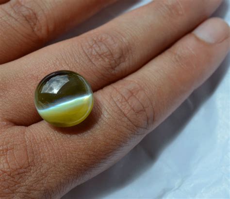 25 04 carat natural apple green cat s eye chrysoberyl gemstone ceylon elizabeth jewellers