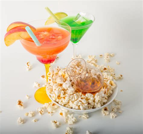 Two Color Drinks And Whisky Single Malt Salty Popcorn In A Bowl Stock