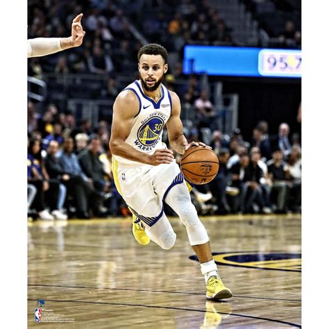 Stephen Curry Golden State Warriors Unsigned Dribbling Photograph