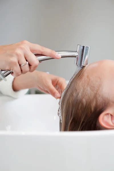 Woman Getting Hair Washed At Salon Stock Image Everypixel