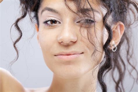 Beautiful Brunette Girl With Long Curly Hair Studio Portrait Stock