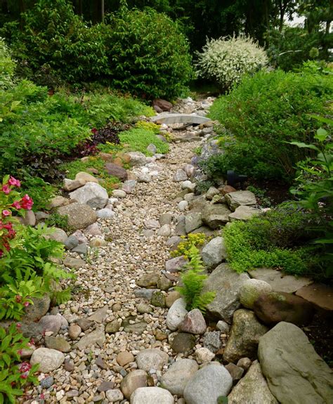 Rock Mix And Edge Plantings Dry Riverbed Landscaping Landscaping