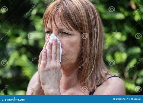 Mature Woman Blowing Her Nose Stock Image Image Of Park People