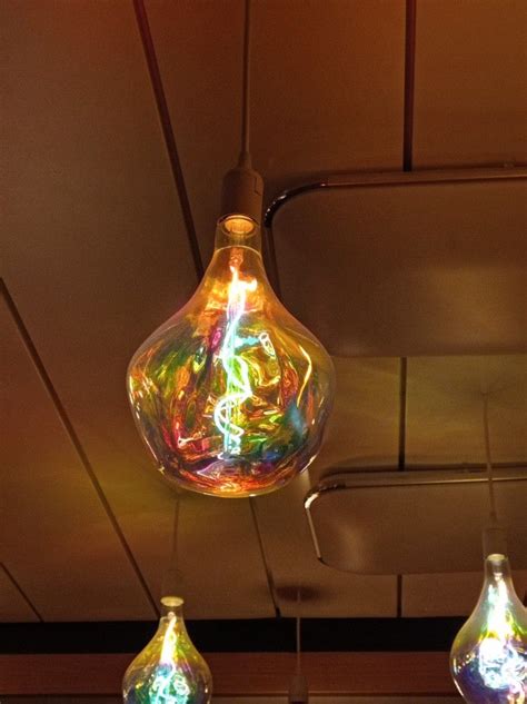 Three Light Bulbs Are Hanging From The Ceiling
