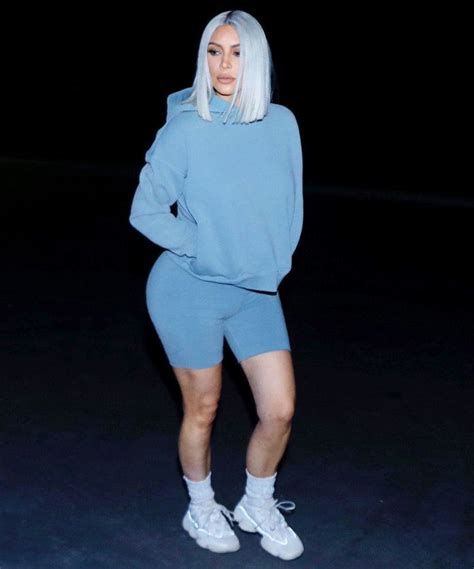 kim kardashian west matches her icy blue hair to her spandex bike shorts kim kardashian