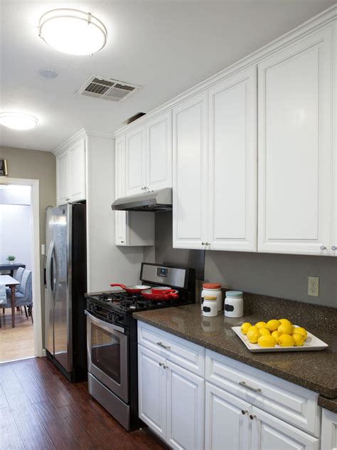 Simple White Galley Kitchen This Simple Galley Kitchen Well Lit And