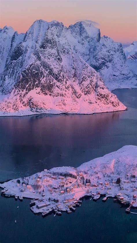 Aerial View Of Snowy Fjord And Reine At Sunrise Nordland Lofoten
