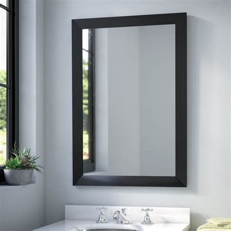 Mirror image without bounds framed thin, trim and exact in pure extruded aluminum with a black finish. Brayden Studio Contemporary Rectangle Vanity Wall Mirror ...