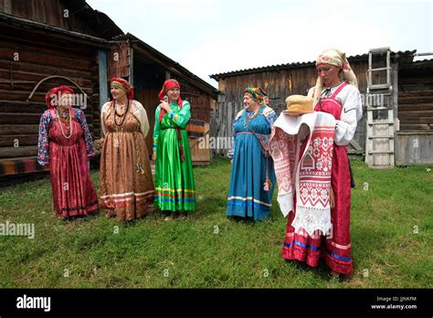 Russian Women Wearing Traditional Sarafan Dress During A Traditional