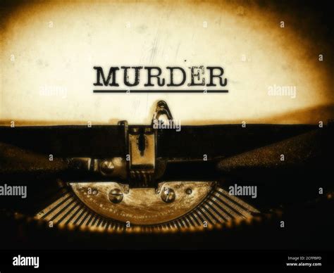Word Murder Written On A Typewriter In Sepia Soft Tone Stock Photo Alamy