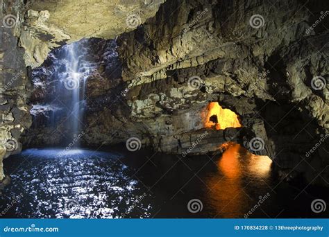 Waterfall Inside Smoo Cave In The Scottish Highlands Stock Photo
