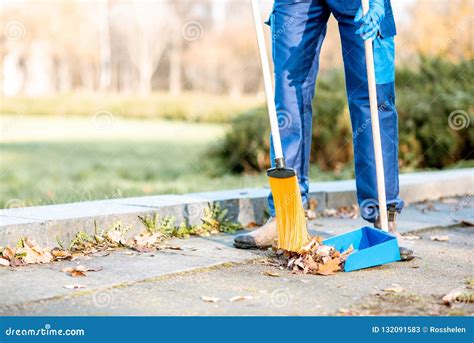 Sweeping Leaves With Broom And Scoop Stock Image Image Of Leaves