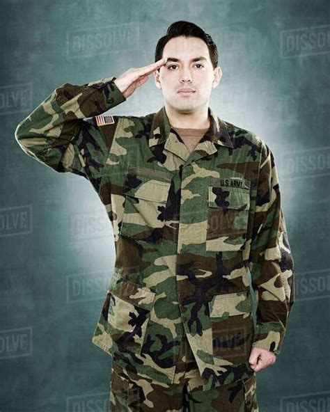 Portrait Of A Soldier Saluting Stock Photo Dissolve