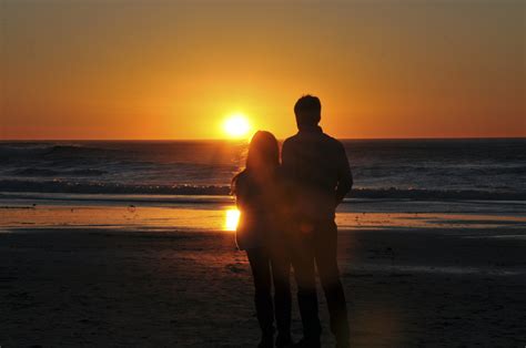Lovers Enjoying Ocean Sunset Free Stock Photo Public Domain Pictures