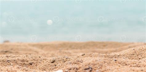 Close Up Surface Of Sand On The Beach And Blur Foreground And Blur