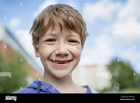 Portrait Of Boy Smiling Close Up Stock Photo Alamy