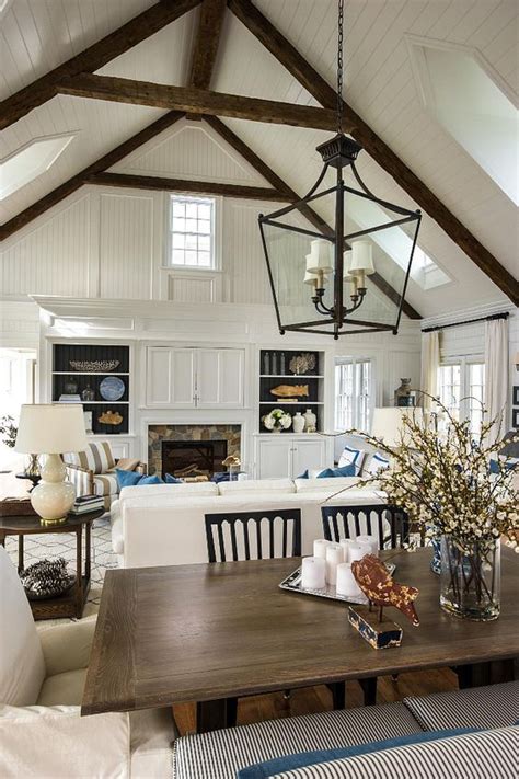 Cool blue cabinets and white walls contrast well with the dark brown ceiling beams to create a. 17 Charming Living Room Designs With Vaulted Ceiling