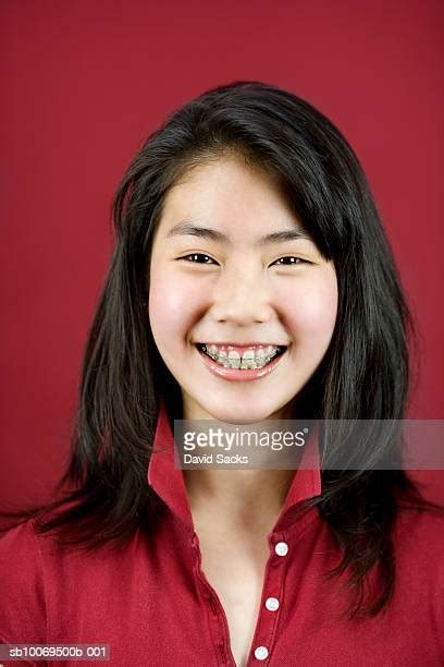 Asian Girl Braces Photos And Premium High Res Pictures Getty Images