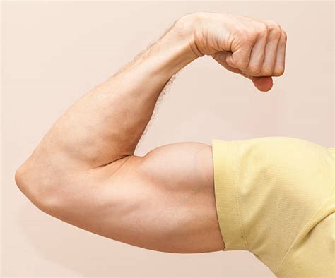Best Man Flexing Arm Stock Photos Pictures And Royalty Free Images Istock