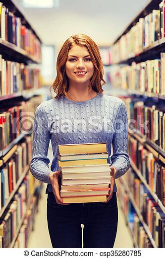 Happy Student Woman Or Woman With Books In Library People Knowledge