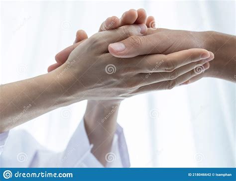 The Doctor Hands Holding Patient Hand To Encouragement And Explained