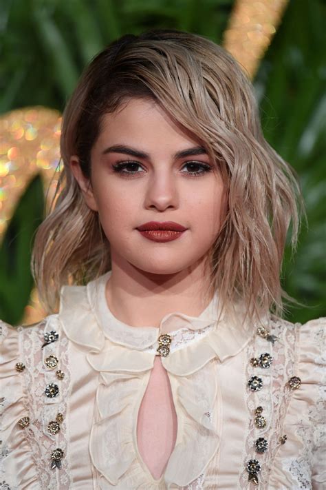 Selena gomez with blonde hair at american music awards 2017. Selena Gomez - Fashion Awards 2017 in London • CelebMafia